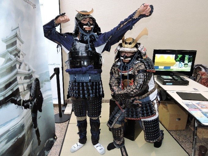 Attendees posing in samurai armor